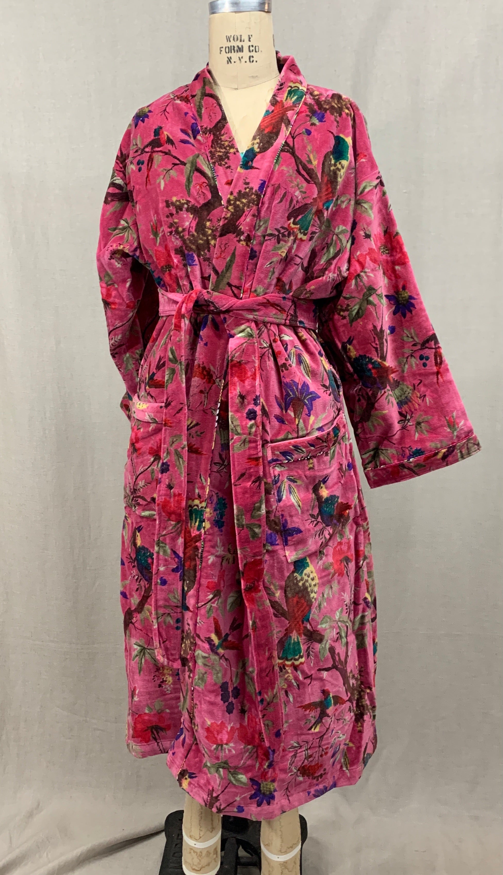 Hot Pink Velvet Robe. It is lined with a very bright colorful cotton fabric. This can be worn as a robe or duster.  It is also reversible. 
